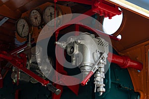 Closeup control valve of steam locomotive. Directional valves allow steam to flow through the steam locomotive engine drive system