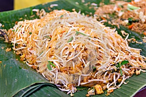 Closeup cooking Pad Thai noodles, Thai street food