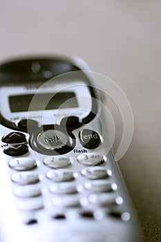 Closeup of cordless phone focus on talk button