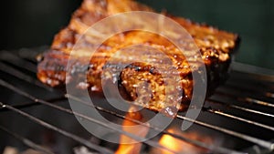 Closeup of a cottage cheese steak being barbecued