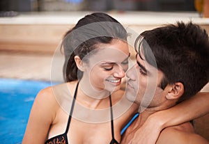 Closeup, couple and partners by hot tub with vacation, romance and relaxing with love, affection and happiness