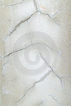 Closeup of cracked in concrete wall concrete texture