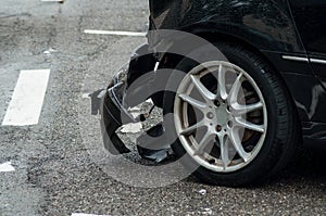 crashed car parked in the street
