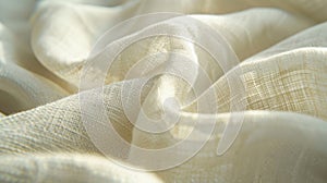 A closeup of a creamcolored linen napkin highlighting the delicate and smooth surface of the fabric photo