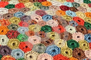 Closeup on a crocheted patchwork rug