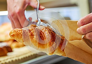 Closeup on croissants with butter in french pastry shop