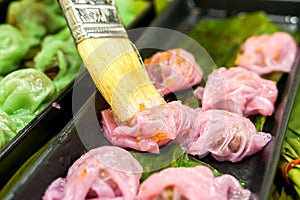 Closeup and crop Thai steamed rice skin dumplings.