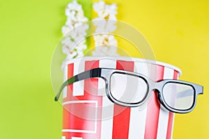 Closeup cropped view photo of paper box with tasty popcorn wearing black cool with reflection specs behaving like a human enjoying photo