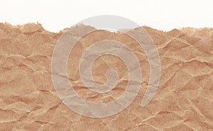 Closeup crumpled grunge brown paper texture background. Brown paper sheet with space for text ,pattern or abstract background.