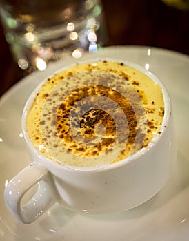 Closeup of a cup of traditional Vietnamese egg coffee