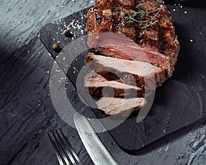 Closeup of cut medium rare roast beef steak