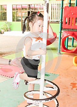 Closeup Cute asia girl playing Playground