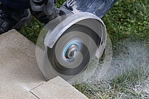Closeup of a cutting professional angle grinder