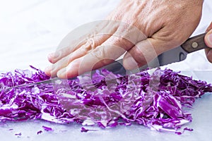 Closeup cutting red cabbage