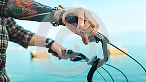 Closeup Of A Cyclist Hand On Bike Handlebars, Holiday Activity Transportation Concept