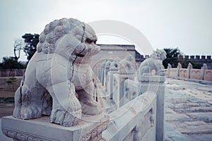 Closeup of a damaged statue on Yuntong Bridge. Zhangjiawan, Tongzhou, Beijing, China. photo