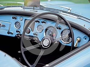 Closeup of the dash board of a classic MG A English sports car in Derbyshire, UK