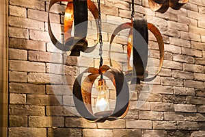 Closeup of Decorative antique edison style filament light bulbs on brick wall