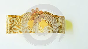 Closeup of of decorative golden silk ribbon