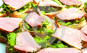 Closeup of delicious ham and salad canapes