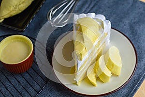 closeup delicious sweet dessert fresh durian thai fruit with whip cream tasty slice vanilla cake