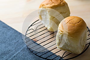 Closeup delicious sweet homemade fresh organic bun , table of br