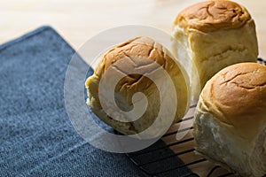 Closeup delicious sweet homemade fresh organic bun , table of br
