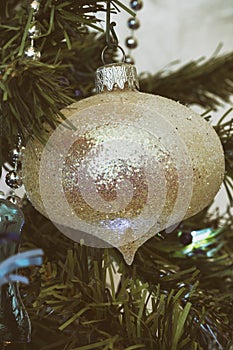 Closeup detail of christmas tree with decorations analog camera style