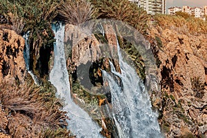 detail view of a Duden waterfall, a water stream breaks from a high cliff - this is a very popular place for tourists and