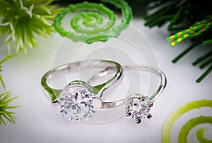 Diamond wedding rings on white background