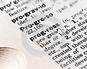 Closeup of the dictionary definition of the word progress