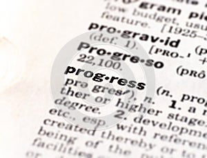 Closeup of the dictionary definition of the word progress