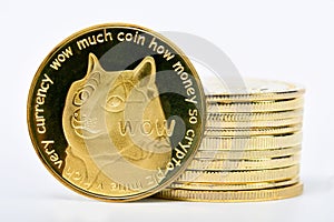 Closeup of a digital dog coin leaning on a bunch of golden coins isolated on a white background