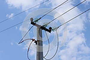 Closeup of the disk insulators made of hardened glass on a power transmission line