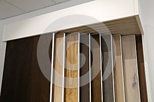 Closeup of a display of samples of laminated floor texture pattern