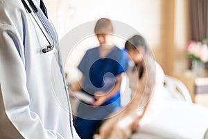 Closeup of doctor in patient room