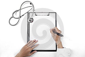 Closeup of doctor writing on blank paper