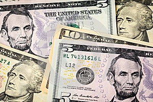 Closeup of $15 dollars with 10 and 5 dollar bills. photo