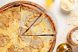 Closeup on dorblu cheese pizza with pears