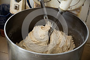Closeup for dough kneading on bread bakery production factory