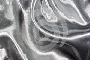 Closeup of Draped Soft Silver Satin Fabric