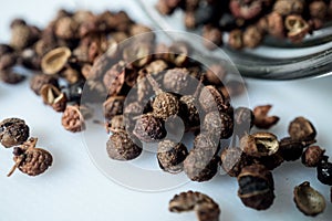 Closeup of dried Sichuan pepper seeds genus Zanthoxylum