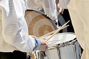 Closeup of a drummer in a brass band.