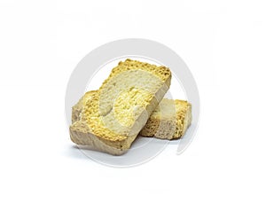 Closeup of dry bread slices isolated on white background