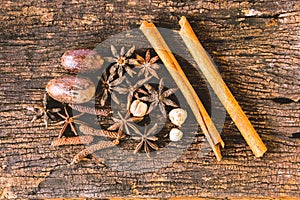 Closeup Dry spices or herbs on old wood background