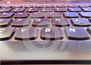 Closeup of dusty laptop computer keyboard