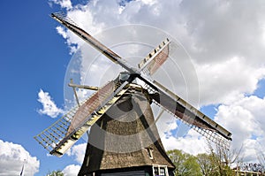 Closeup of a Dutch windmill, center connecting four wings