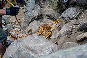 Closeup of a dynamic rope on the mountain rocks, mountaineering in Cercedilla, Spain photo