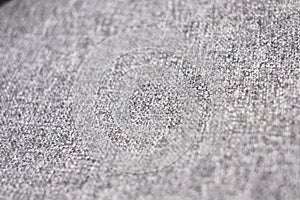 Closeup elective focus of grey fabric texture. Grey linen texture background. photo