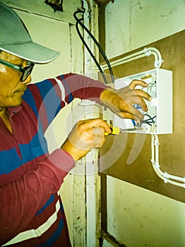 Closeup of electrician works